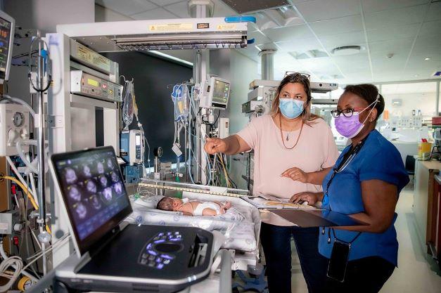 Drs Natasha Rhoda, Martha Mkony in Mowbray maternity Unit, SA.